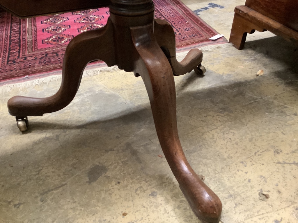 Two similar George III parquetry inlaid mahogany octagonal tilt top tables, width 96cm, height 73cm